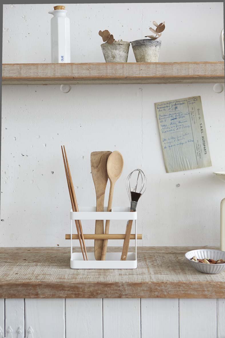Oversize utensils in Yamazaki organizer on kitchen shelf